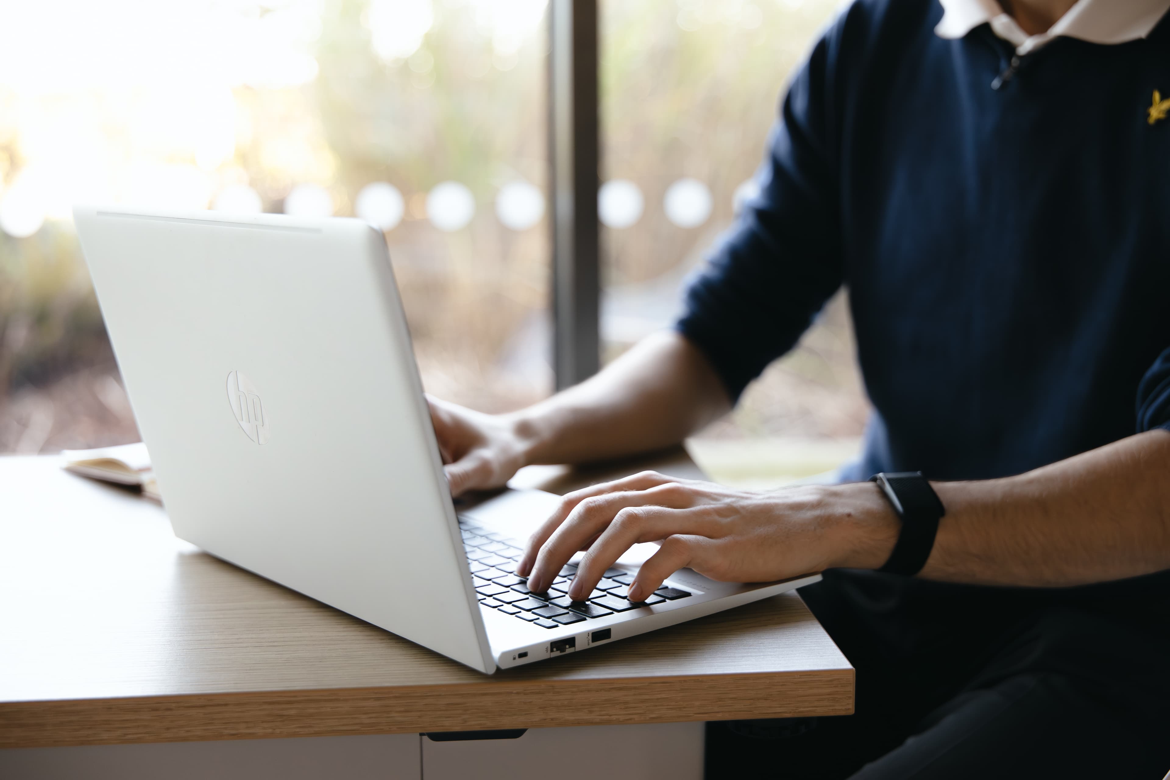 Engineer running vulnerability scans on a laptop